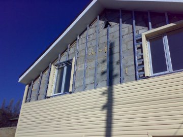 отделка фасада деревянного дома панелями