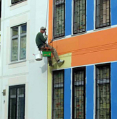 Окрашивание фасада дома после монтажа систем скрепленной теплоизоляции